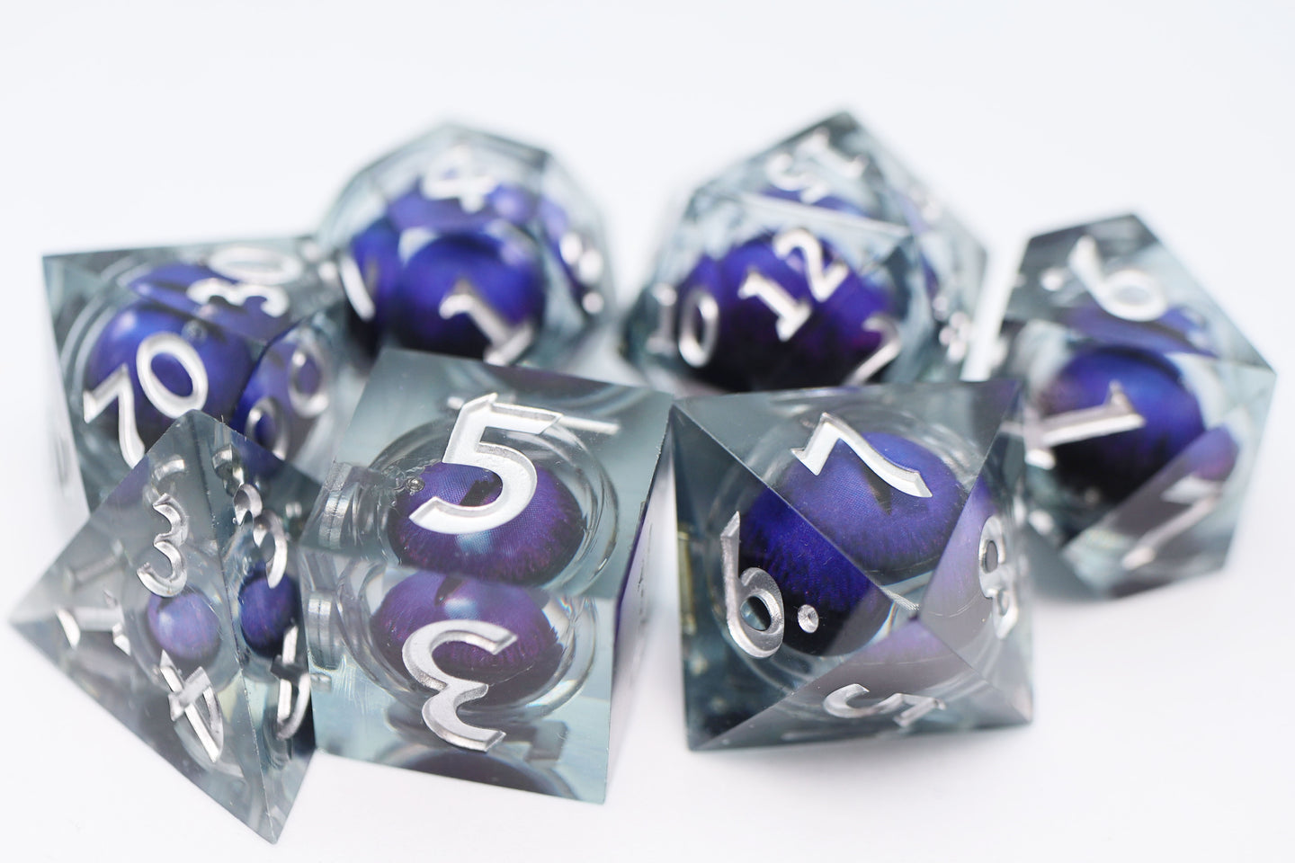 Sharp Edge Moving Eye RPG Dice Set - Purple Cyclops | GrognardGamesBatavia