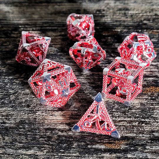 Deep Dreamer Silver Red Hollow Metal RPG Dice Set | GrognardGamesBatavia